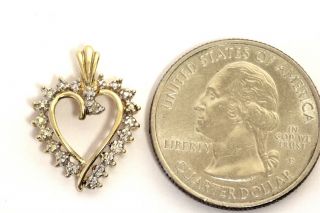10k Yellow Gold.  005ct Si1 H Diamond Heart Slide Pendant 1.  5g Estate Vintage