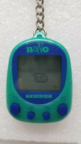 Vintage 1997 Playmates Nano Teddy Virtual Electronic Keychain Pet Toy -