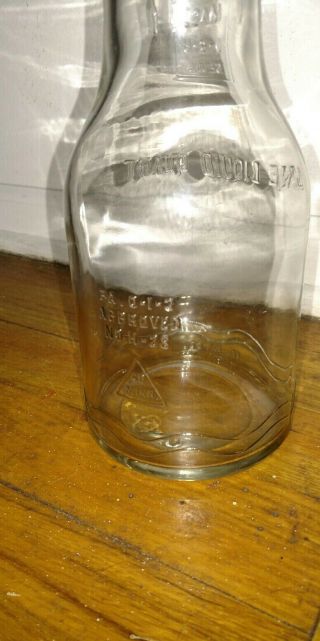 Vintage oil 1 quart glass bottle H.  M co with tin metal spout 2