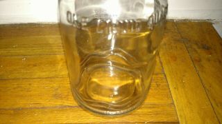 Vintage oil 1 quart glass bottle H.  M co with tin metal spout 3