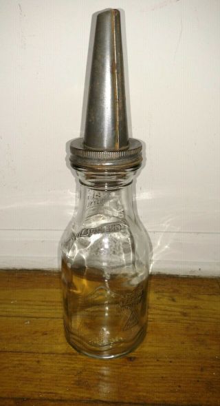 Vintage oil 1 quart glass bottle H.  M co with tin metal spout 7