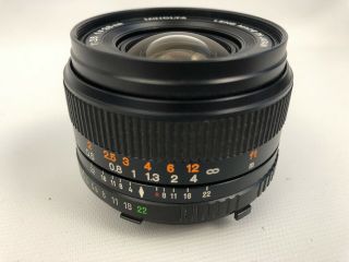 Vtg Minolta MD Minolta Celtic 28mm 1:2.  8 SLR Camera Lens W/Celtic Front Len Cap 4