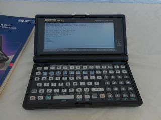 Hewlett Packard 100LX Palmtop PC/1MB Ram W/ Booklet Turns On/Off 6