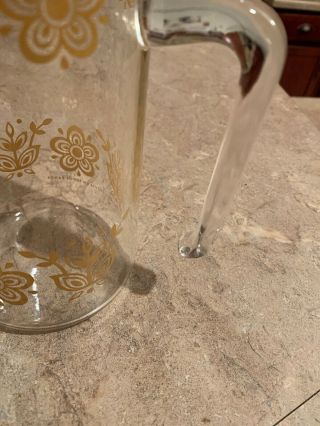 Vintage Pyrex Glass Pitcher Gold Butterfly - Glass handle open 7” x 3.  75” 4