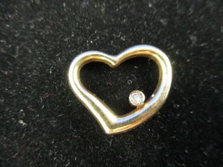 Vintage 10k Yellow Gold Heart Shaped Pendent With A Small Diamond