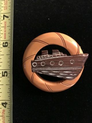 Vintage Bakelite Pin.  Wood Cruise Ship In Bakelite Life Ring