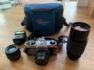 K1000 Asahi Pentax Camera,  Lowe Pro Bag,  2 Lenses,  Flash