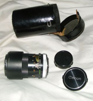 Canon Fd 135mm 1:3.  5 Lens W/lens Caps And Carrying Case Japan