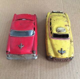 (2) Vintage 1950s Asahi Toy Japan Tin Friction Toy Cars Taxi