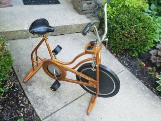 Vintage Gold / Orange Schwinn Exercise Bike