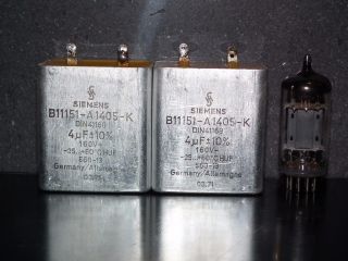 Two vintage Siemens PIO capacitors 4 uF 160V Klangfilm Made in Germany 1971 4mfd 2