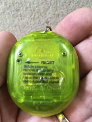 Vintage Green Nano puppy key chain 1997: Virtual pet.  Tamagotchi Tomagotchi 8