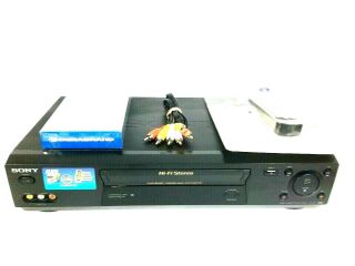Sony Slv - N77 Vhs Recorder/player Flash Rewind 4 Head W/ Vhs Tape,  Cables,  Remote