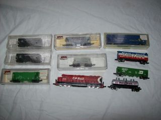 9 Vintage N Scale Train Cars And A Locomotive Engine