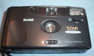 Kodak Star Motor 35mm Film Dx Programmed Fix Focus 29mm F/5.  6 Lens Flash Camera
