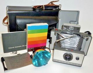 Polaroid Automatic 103 Land Camera With Flash,  Film And Instruction Book