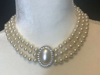 Vintage Triple Strand Necklace Faux Pearls With Pearl And Rhinestone Centerpiece