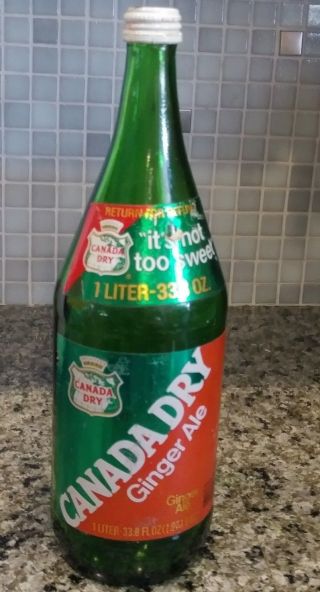Vintage Canada Dry Ginger Ale 33.  8oz Glass Bottle.  Empty With Screw Cap.  C