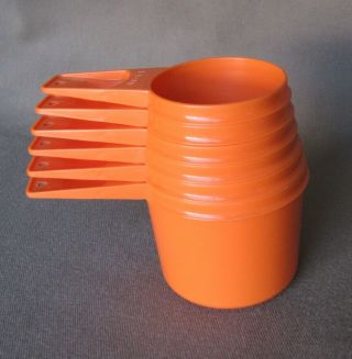 Vintage Tupperware - 6 - Piece Nesting Measuring Cup Set (complete) Bright Orange