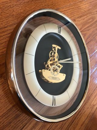 Vintage SEIKO Oval skeleton Gold finish Quartz Wall Clock Model QAX201G. 3