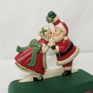 Cast Iron Christmas Stocking Holder Double Mistletoe Santa And Mrs Claus Vintage