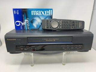 Panasonic Pv - 7450 Vcr With Remote Control And Video Cassette