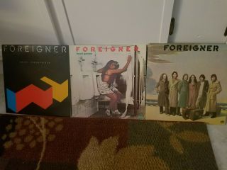 3 Foreigner,  2 Genesis Vintage Vinyl Lps