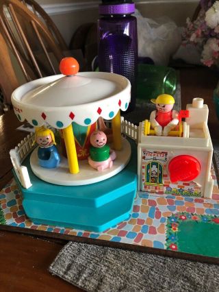 Vintage Fisher Price Little People Merry Go Round With People Well