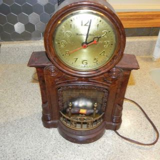 01704 Vintage Mastercrafters Clock & Radio Bakelite Clock Animated Fireplace
