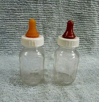 Two Vintage Evenflo Brand Clear Glass 125 Ml Baby Bottles Rubber Nipples Sh