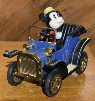 Vintage 1981 Masudaya Mickey Mouse Lever Action Tin Toy Car Blue Rolling Moving