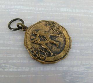 Vintage 1928 I.  P.  A.  B.  T.  boxing medal golden gloves ? Brass 1.  15 inches 2