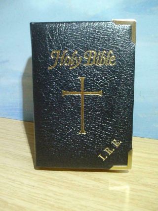 Black Leather Bound,  Pocket Size Holy Bible With Brass Corners.