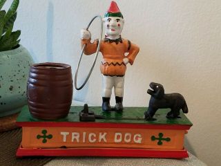 Vintage Cast Iron Mechanical Bank Clown Dog Barrel