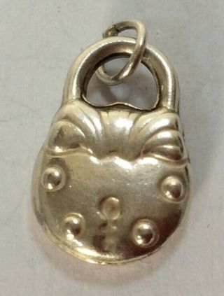 Vintage Silver Bracelet Charm Of A Detailed Puffy Locket