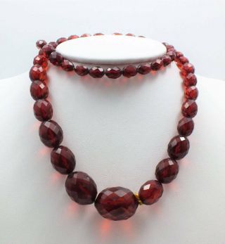 VINTAGE BAKELITE CHERRY RED AMBER FACETED GRADUATING BEAD NECKLACE 38.  3 GRAMS. 2