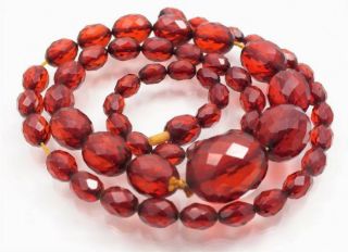 VINTAGE BAKELITE CHERRY RED AMBER FACETED GRADUATING BEAD NECKLACE 38.  3 GRAMS. 3