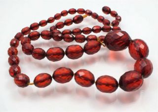 VINTAGE BAKELITE CHERRY RED AMBER FACETED GRADUATING BEAD NECKLACE 38.  3 GRAMS. 5