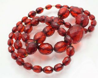 VINTAGE BAKELITE CHERRY RED AMBER FACETED GRADUATING BEAD NECKLACE 38.  3 GRAMS. 6