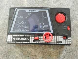 Vintage Tomy Space Dock Hand Held Pocket Arcade Wind Up