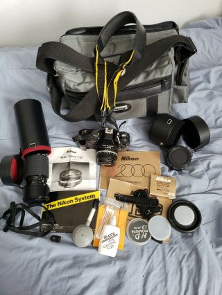 Vintage Nikon N2000 35 Mm Camera With Lens,  Case,  And Accessories Pictured