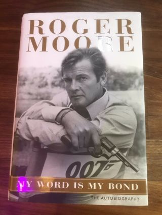 Roger Moore Signed Book My Word Is My Bond.