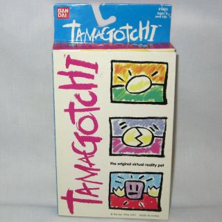 Vintage 1997 Tamagotchi Gold Egg Bandai Virtual Reality Pet Toy