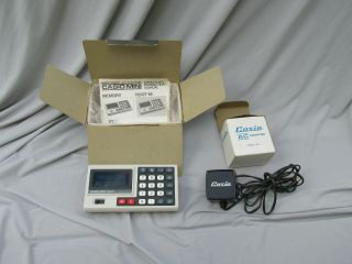 Vintage Casio - Mini Electronic Calculator And Adaptor Old Stock Nos