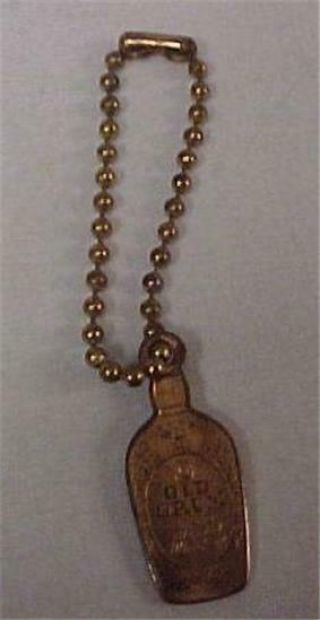 Key Chain - Vintage With Calvert Distillers Of Old Drum " Lucky Piece " 13605c