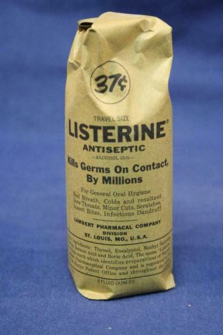 Vintage Listerine Antiseptic 3 Oz.  Glass Bottle In Paper Wrapper
