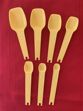 Vintage Set of 7 Canary Yellow Tupperware Measuring Spoons 2
