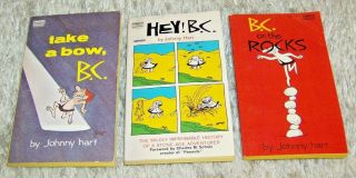 3 B.  C.  Paperbacks By Johnny Hart,  On The Rocks,  Take A Bow,  And Hey B.  C.