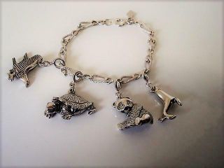 Vintage Sarah Coventry Silver Tone Bracelet With Panda Eagle Turtle Seal Charms