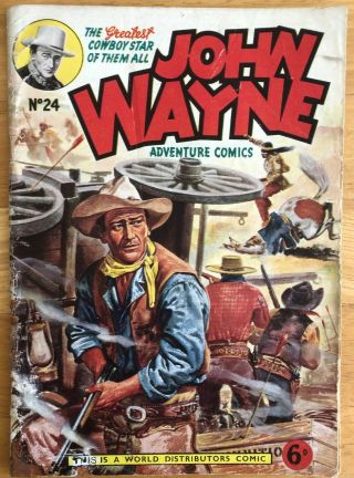 John Wayne Adventure Comics 24 Pub Wdl Rubbed Covers.  Good Plus